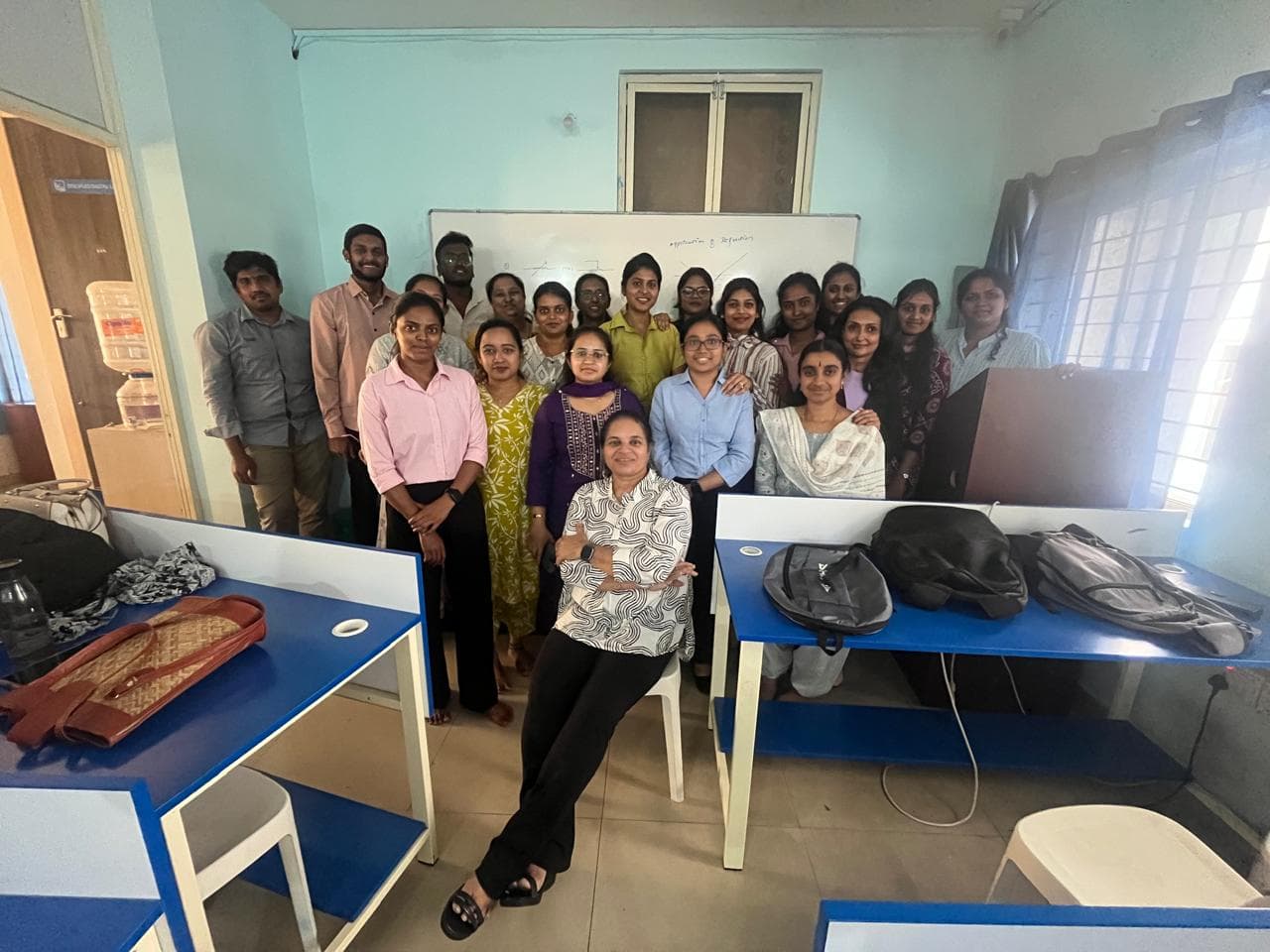 Group photo with learners after completing a training program.
